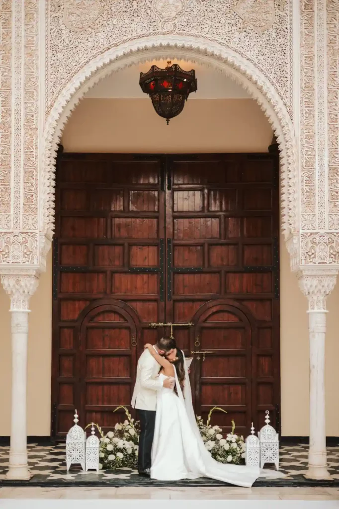 Bride and groom in white wedding